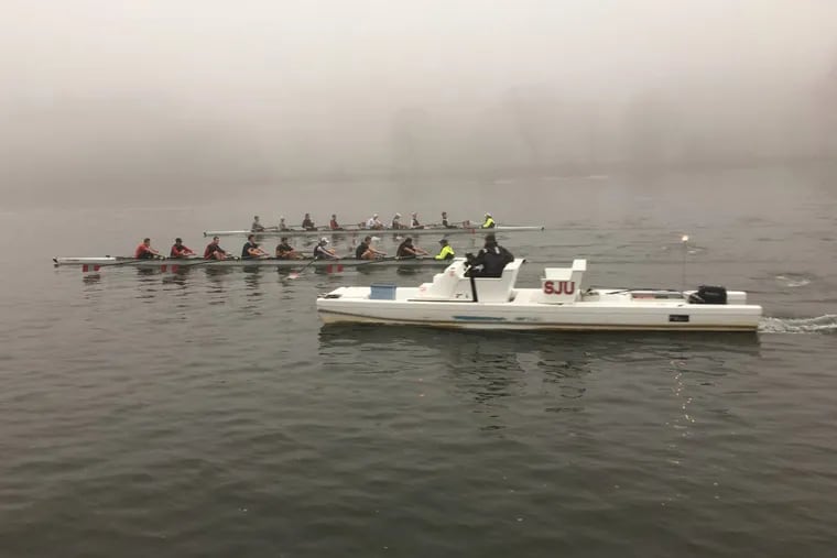 Fog envelopes rowers on the Schuylkill on the morning of Tuesday. April 4, 2018.