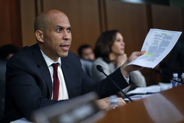 Sen. Cory Booker, D-N.J., questions witnesses before the Senate Judiciary Committee during the final stage of the confirmation hearing for President Donald Trump's Supreme Court nominee, Brett Kavanaugh, on Capitol Hill in Washington, Friday, Sept. 7, 2018.