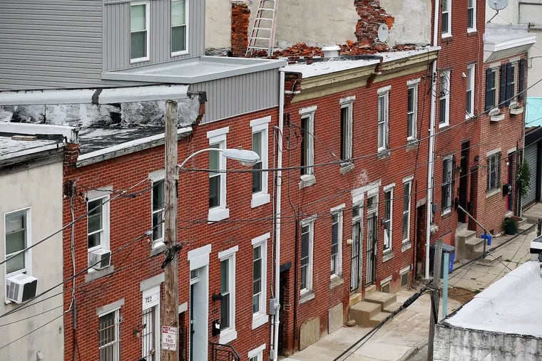 Rowhouses are pictured in the 700 block of South Chadwick Street in September 2020. A new analysis of federal mortgage data by Reinvestment Fund, a Philadelphia-based community investment nonprofit, found that mortgage applications dropped in 2022.