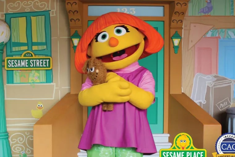 Julia, a Sesame Place character who has autism