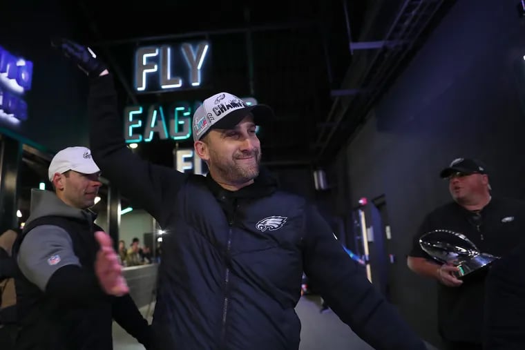 Eagles defensive coordinator Jonathan Gannon (left) and head coach Nick Sirianni (right) celebrate after the team's 31-7 victory over the 49ers in the NFC championship game.