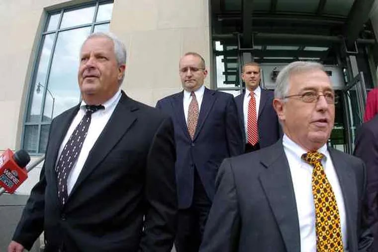 Former Judges Michael T. Conahan and Mark A. Ciavarella Jr. (front, from left), who faced trial on criminal charges in the "kids-for-cash" kickback scheme, also are defendants in civil suits.
