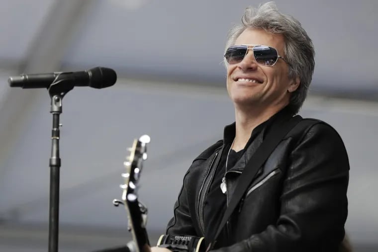 Musician Bon Jovi performs during a surprise appearance at the Fairleigh Dickinson University commencement ceremony, Tuesday, May 16, 2017, at MetLife Stadium in East Rutherford, N.J.
