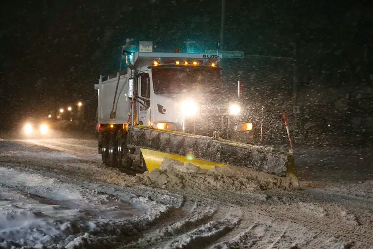 A snow plow moves north on Rt.113 at Rt.401 in Chester Springs during the storm, Monday,  February 1, 2021.