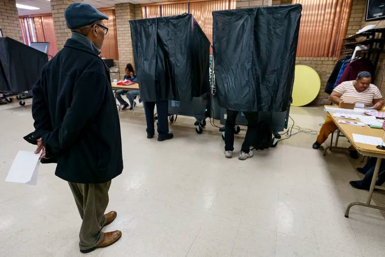 James Harris Jr. waits to vote at Zion Baptist Church Of Philadelphia,  on Tuesday, Nov. 5, 2019 in Philadelphia. Pennsylvania's municipal elections featured contests for two statewide appellate judgeships, as well as some potential firsts in local contests.