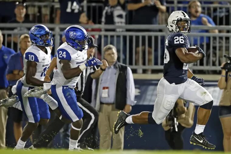 Penn State’s Saquon Barkley outruns defenders on 85-yard catch-and-run touchdown.