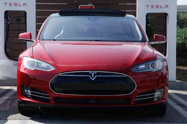 The new Tesla Model S P85D produces extra power with the addition of a second electric motor putting out the equivalent of 691 horsepower. It's priced at $104,500. (Myung J. Chun/Los Angeles Times/TNS)