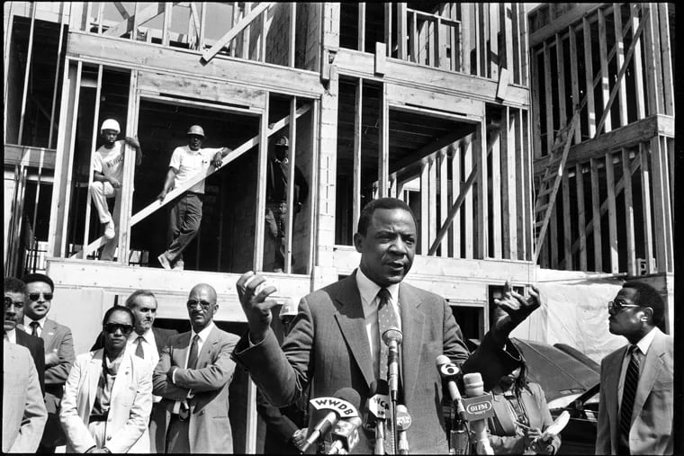 Mayor W. Wilson Goode addressed reporters as work began on rebuilding the West Philadelphia homes destroyed in the May 13, 1985, MOVE confrontation.