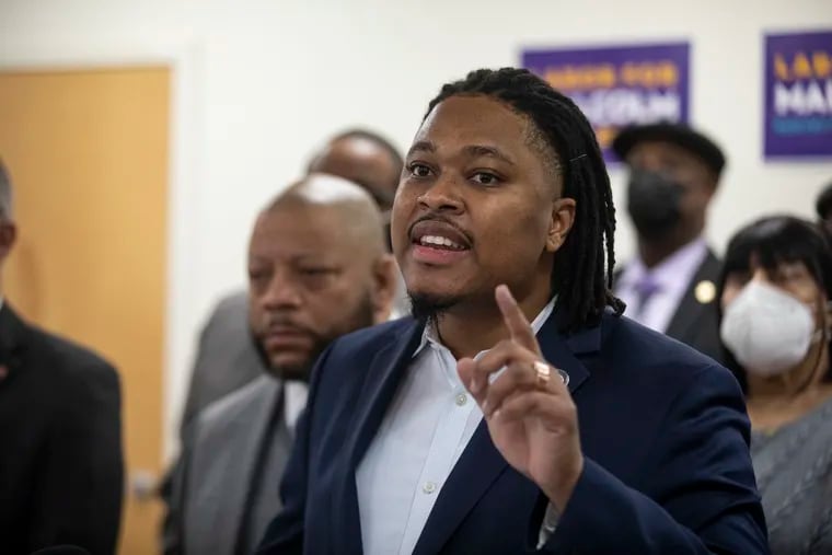 State Rep. Malcolm Kenyatta speaking to reporters and members of District Council 33 after being introduced by union president Ernest Garrett in Philadelphia on Thursday.