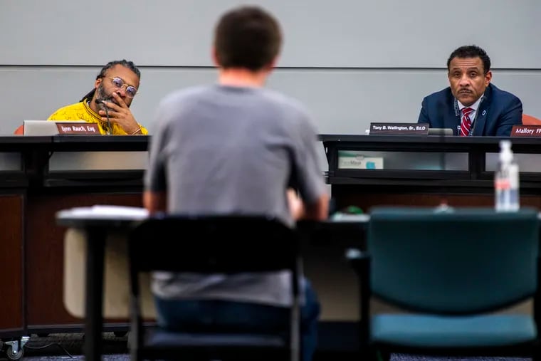 Superintendent Tony Watlington (right) and school board president Reginald Streater (left), shown in this March file photo, heard details of a $4.5 billion 2023-24 budget Thursday night.