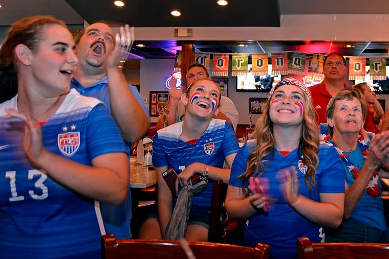 Sweet victory! The hometown crowd at Throwbacks Bar and Grill in Delran had plenty to cheer about. Carli Lloyd delivered lots of kicks. Story and another photo on A6.