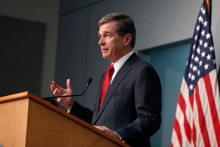 North Carolina Gov. Roy Cooper speaks during a briefing at the Emergency Operations Center in Raleigh.