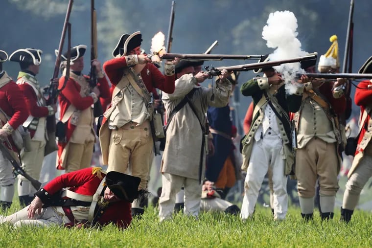 File: Reenactment of the Battle of Brandywine on Sept. 11, 1777, a crushing defeat for the patriots, allowing the British to take Philadelphia.