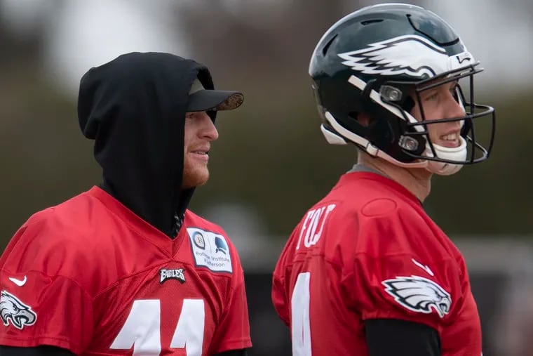 Nick Foles (right) is likely to start Sunday against the Rams in place of the injured Carson Wentz (left).
