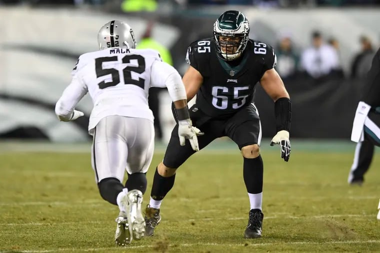 Eagles All-Pro right tackle Lane Johnson gets ready to block Oakland Raiders defensive end Khalil Mack during the game at Lincoln Financial Field in a Monday Night Football game Christmas night 2017.  Eagles won 19-10.