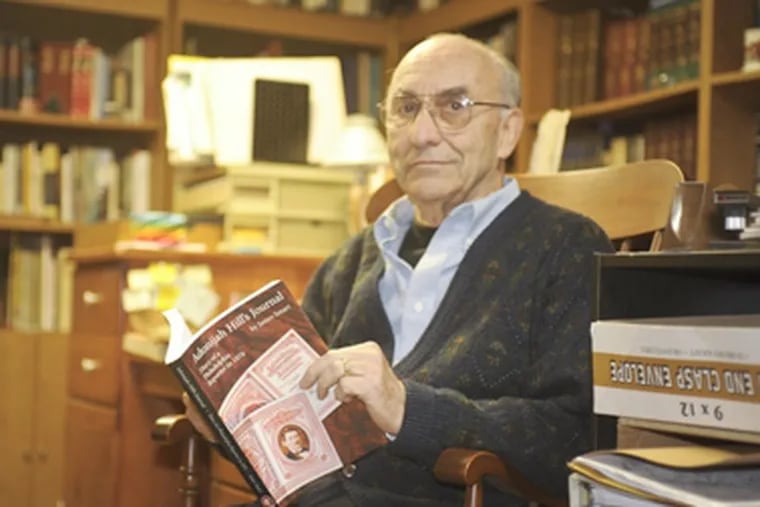 Mr. Smart sits with a copy of "Adonijah Hill's Journal." His sources for the 2011 book included newspapers, magazines, and real estate records.