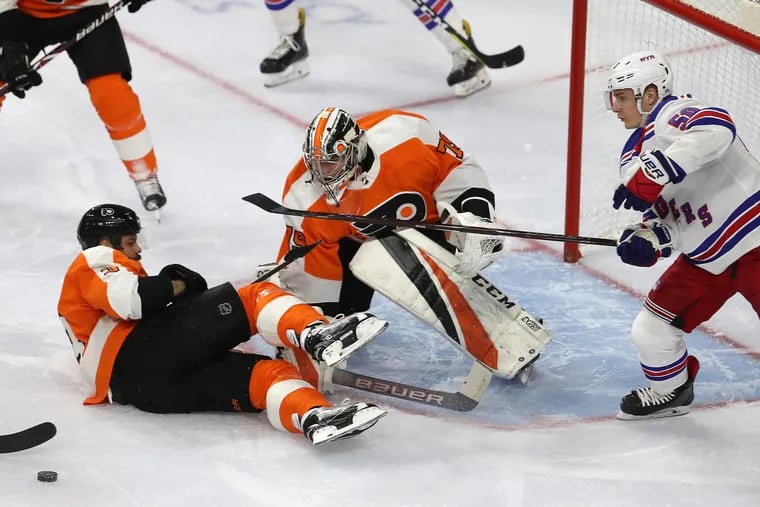 Flyers prospect Carter Hart, shown making a save in a preseason game against the Rangers, had an impressive pro debut Saturday for the Lehigh Valley Phantoms in the AHL.