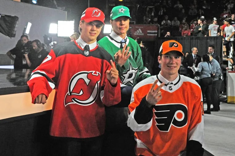 New Jersey Devils center Nico Hischier (left), Flyers center Nolan Patrick (right), and Dallas Stars defenseman Miro Heiskanen (center) pose after being selected in the first round of the 2017 NHL Draft. Patrick Gorski/Icon Sportswire