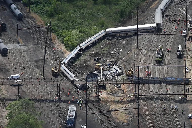 An aerial view of the Amtrak train 188 derailment in the Port Richmond section of Philadelphia, Pa. on May 13, 2015. ( DAVID MAIALETTI / Staff Photographer )
