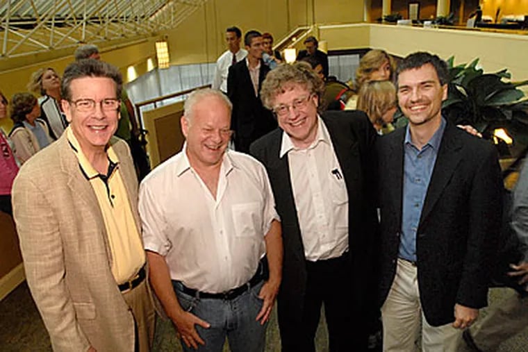 A group of well-known psychologists at a conference at the Philadelphia Sheraton: from left to right, Ed Diener of the University of Illinois; martin Seligman of UPenn; Michael Frese of the University of Giessen in Germany; and James Pawelski of UPenn. (April Saul / Inquirer)