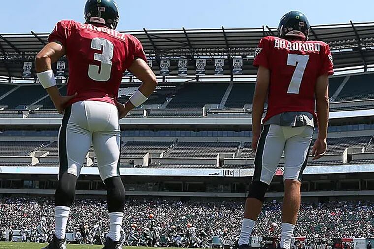 Eagles quarterbacks Mark Sanchez and Sam Bradford. (David Maialetti/Staff Photographer)