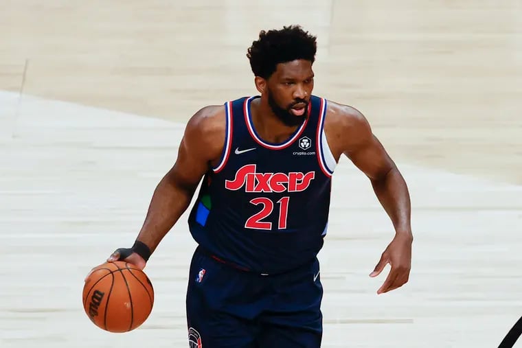 Sixers center Joel Embiid dribbles the basketball against the Toronto Raptors during game six of the first-round Eastern Conference playoffs on Thursday, April 28, 2022 in Toronto.