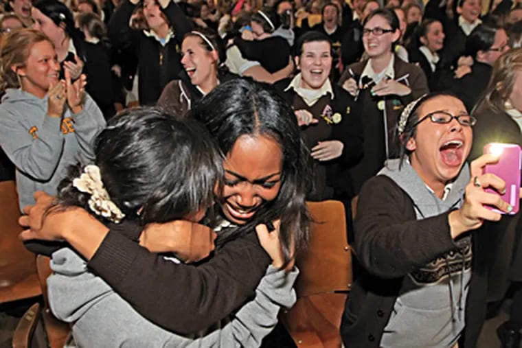 Students (from left) Alexis Mutt , Claresa Nathaniel, and Alexa Bradley react to learning St. Hubert's will survive. (Michael Bryant / Staff Photographer)