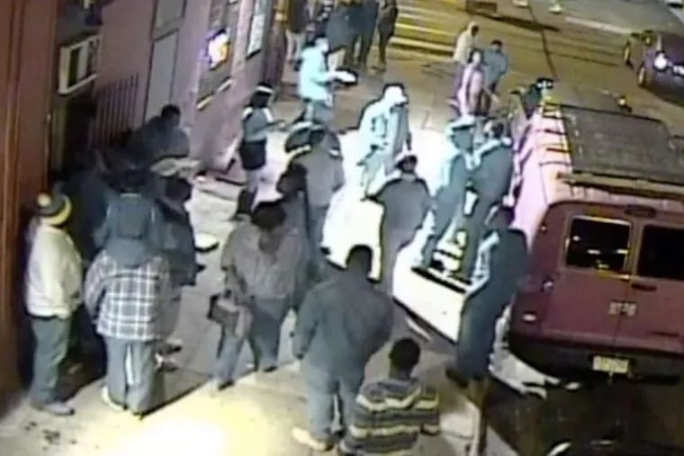 Screenshot from surveillance video of crowd outside the Last Chance Lounge at 18th Street and Girard Avenue in North Philadelphia moments before shootout that killed Nafis Owens on Nov. 8, 2014.