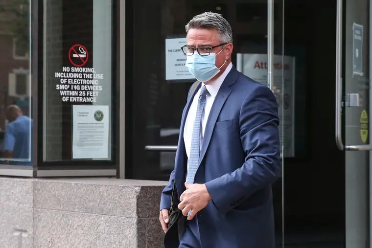 Bobby Henon leaves the federal courthouse in Philadelphia in October, while he and union leader John Dougherty stood trial on bribery and conspiracy charges.