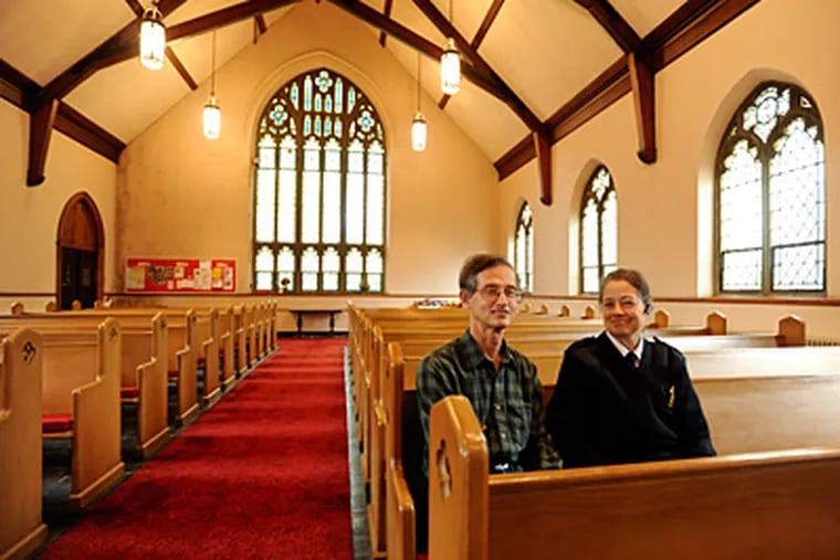 Jan Ten Boom and Sylvia Mullen, brother and sister who are longtime members of First Baptist in Ardmore, sit in the once-crowded sanctuary. (Ron Tarver / Staff Photographer)