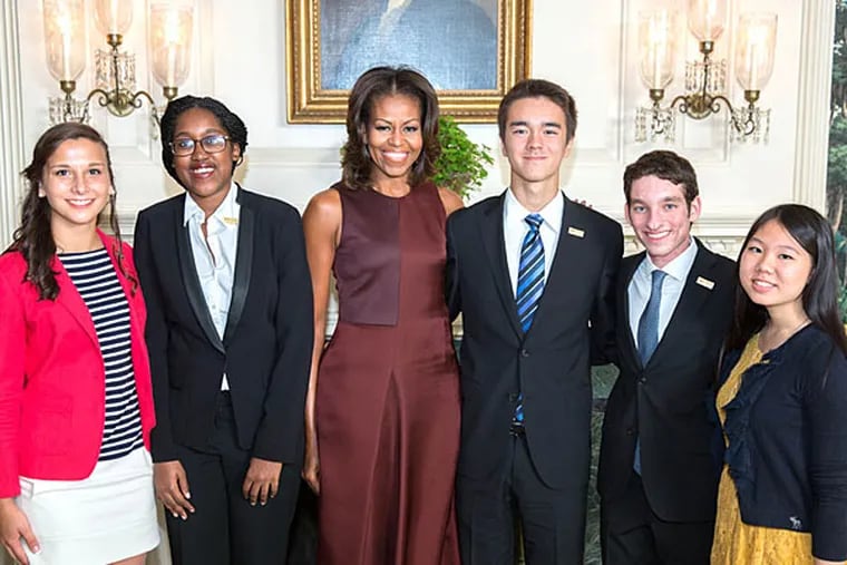That’s Sojourner Ahebee, second from left, next to first lady Michelle Obama, at the White House last month to receive her National Student Poets award. (Lawrence Jackson)