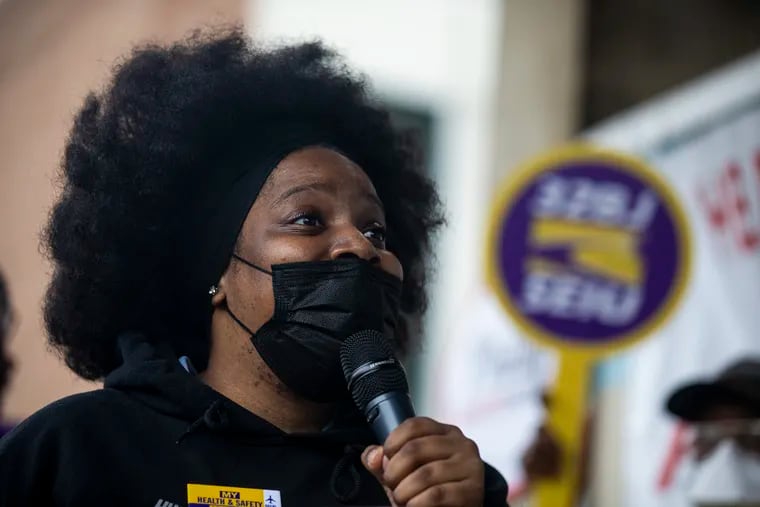 Venus Joyner, a passenger service agent at PHL, spoke at a rally on the importance of having better wages and health benefits while working in a pandemic at Philadelphia International Airport on May 5, 2021. Philadelphia City Council passed a bill Thursday to establish new pay and benefits standards for airport workers.