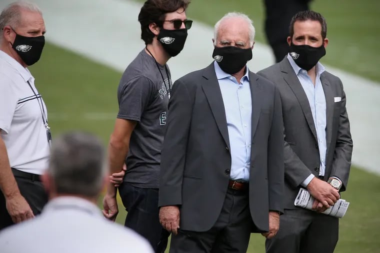 Eagles owner Jeffrey Lurie (second from right) has been quiet this season about the decline of his football team and the futures of coach Doug Pederson and vice president Howie Roseman (right).