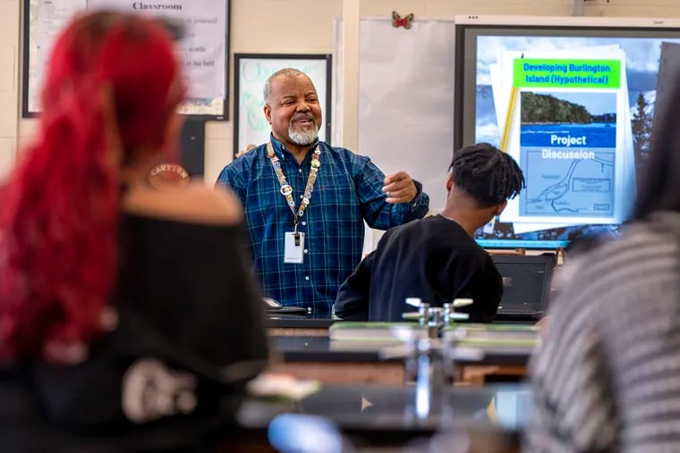 Al Jackson teaches science at Burlington City High School Monday, Mar. 11, 2024. He  began preparing for a second career in teaching while serving active duty in the U.S. Air Force. Other retirees from the military and corporate America are joining the teaching ranks.