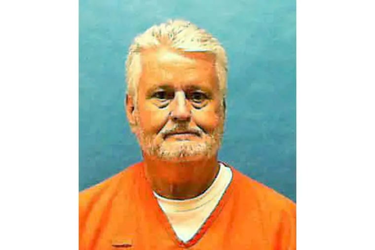 This updated photo made available by the Florida Department of Law Enforcement shows Bobby Joe Long in custody. Long, is scheduled to be executed Thursday, May 23, 2019, for killing 10 women during eight months in 1984 that terrorized the Tampa Bay area. He was sentenced to 401 years in prison, 28 life sentences and one death sentence. His execution is for the murder of 22-year-old Michelle Simms. (Florida Department of Law Enforcement via AP)