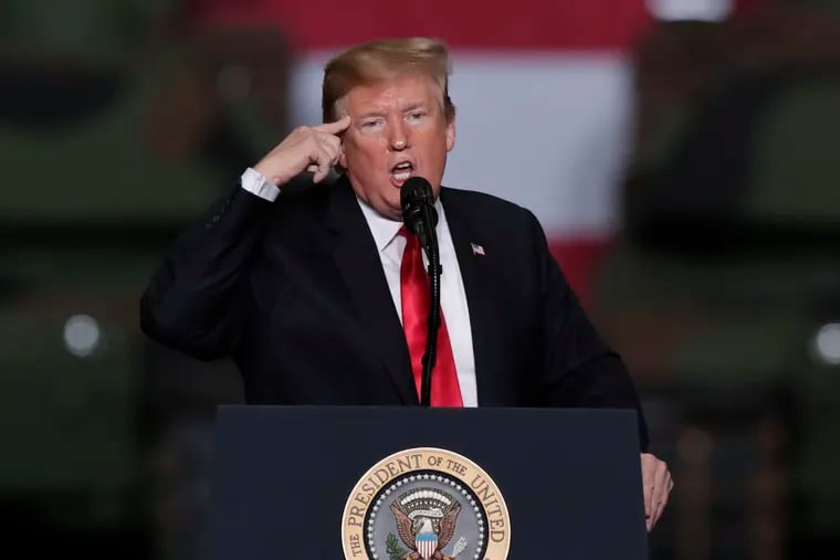 President Donald Trump speaks at Joint Systems Manufacturing Center in Lima, Ohio on Wednesday, in a speech which included an attack on the late Sen. John McCain (R., Ariz.).