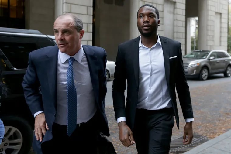 Rapper Meek Mill, right, arrives at the Criminal Justice Center with his lawyer Brian McMonagle, left, in Philadelphia, PA on November 6, 2017. DAVID MAIALETTI / Staff Photographer