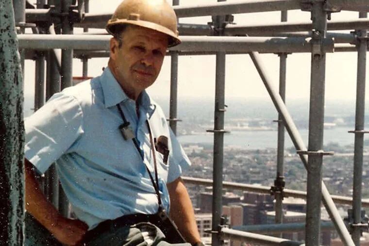 John Norris Childs Jr. worked on the cleaning of City Hall tower.