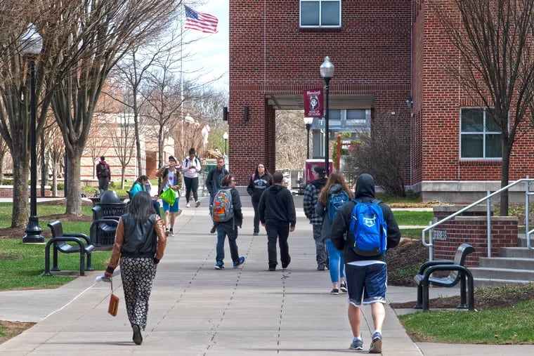 Students walk across campus at Bloomsburg University, one of 14 universities in Pennsylvania's state system.
