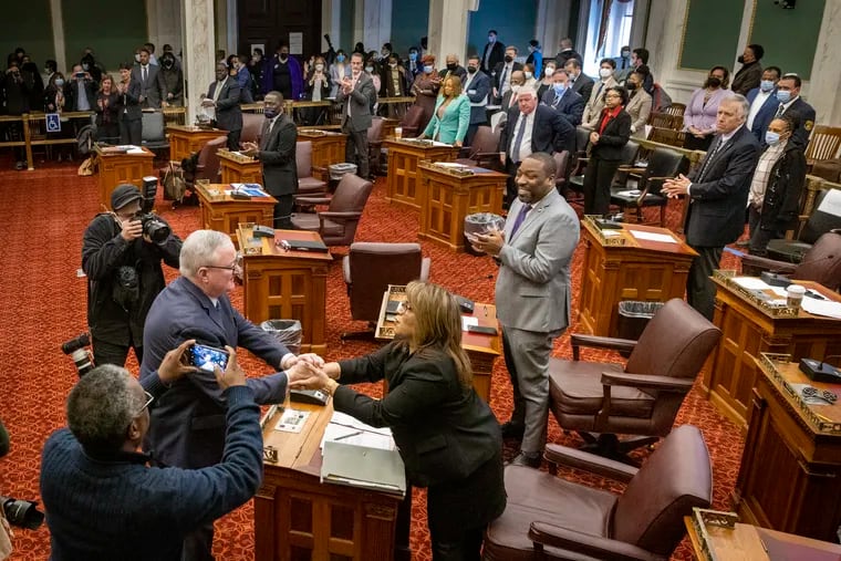Philadelphia Mayor Jim Kenney shakes hands with Councilmember Quetcy Lozada after delivering his budget address to City Council.