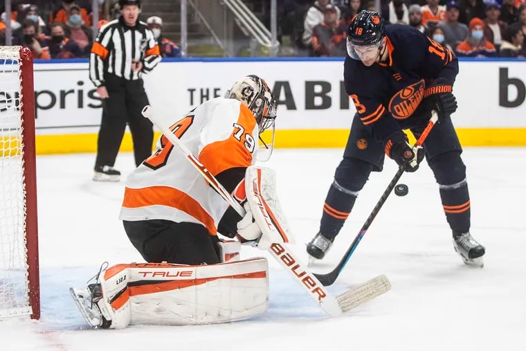 Flyers goalie Carter Hart makes the save on Edmonton Oilers' Zach Hyman during the second period Wednesday. The Flyers won, 5-3, and handed Edmonton its first loss.