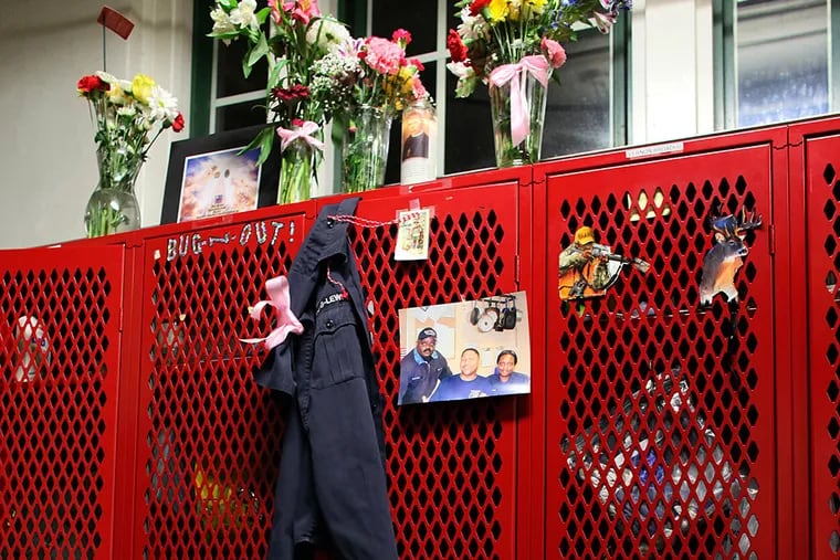Memorials adorn the locker of fallen firefighter Joyce Craig at Engine Company 64.