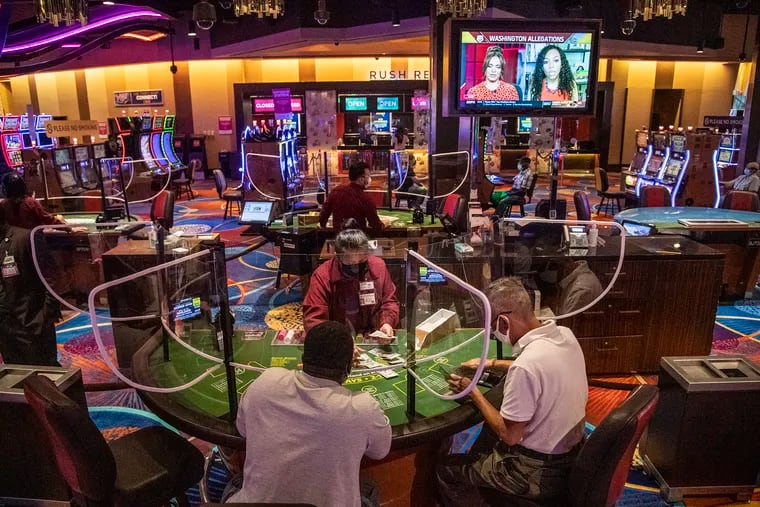 Dealers tables surrounded by plexiglass during the opening day for the Rivers Casino in Philadelphia in July.