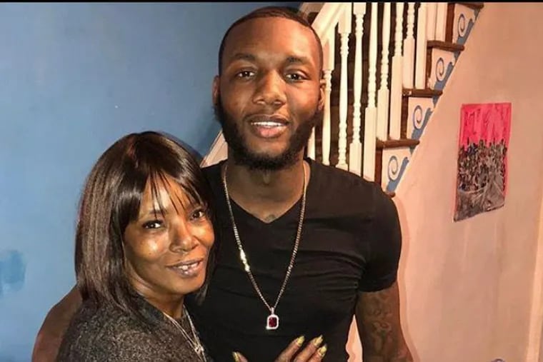 Eric Michael Carter, 23, of Philadelphia, right, was indicted by a virtual grand jury in Mercer County, N.J., for a robbery case in Trenton. He is pictured here with his mother, Helen Carter.