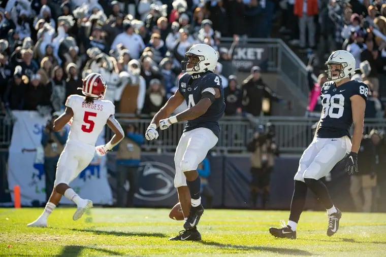 Penn State's Journey Brown (4) celebrates his 35-yard touchdown run in the third quarter of Saturday's home win over Indiana.