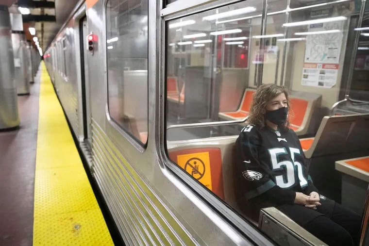 SEPTA General Manager Leslie Richards rides the Broad Street Line at NRG Station after holding a press briefing on the return of "Sports Express" service for Sunday's Eagles-Ravens game on Friday, Oct. 16, 2020.