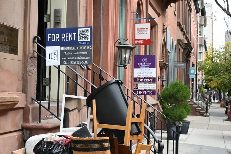 Signs advertise apartments and homes for rent in Center City in October 2021.