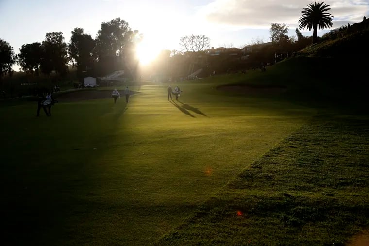 The group of John Huh, Cameron Smith and Thomas Pieters walk to the second green during the third round of the Genesis Open golf tournament at Riviera Country Club, Saturday, Feb. 18, 2017, in the Pacific Palisades area of Los Angeles. (AP Photo/Ryan Kang)