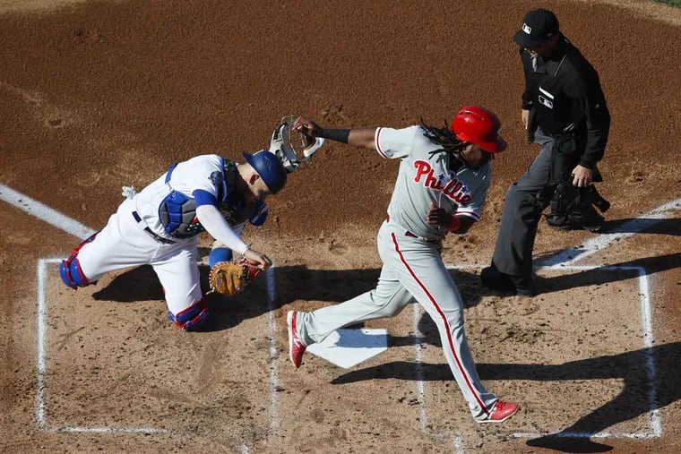 The Phillies' Maikel Franco missing home plate in the second inning Thursday. 