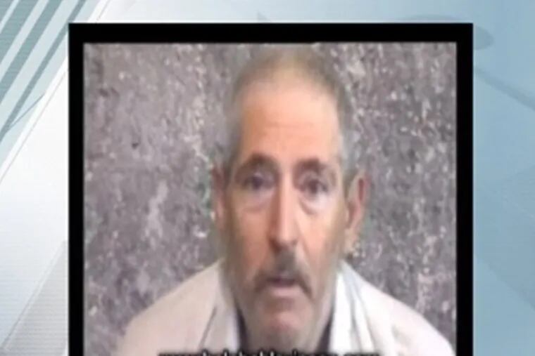 Retired FBI agent Robert Levinson appears in a frame grab from the family’s website. His wife received the video last year.